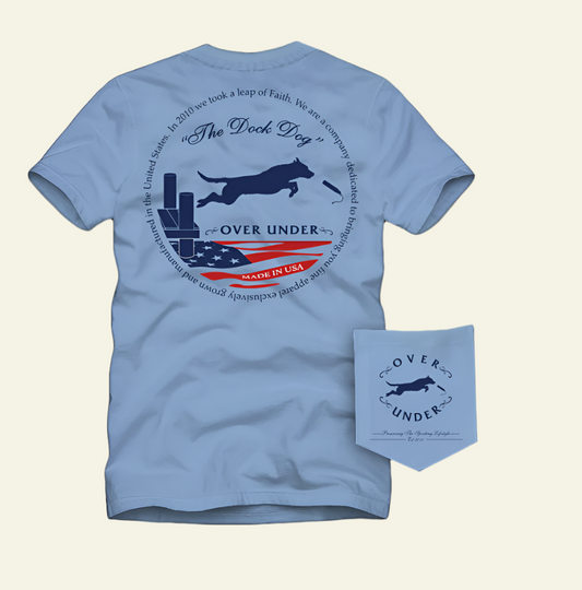 Light blue t-shirt with 'Cover Under' branding and graphics on a white background